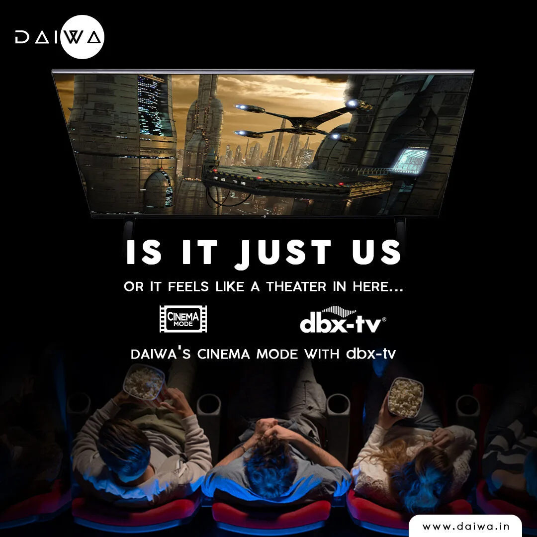 Popcorn-holding viewers in theater seats face a TV showing a sci-fi city; 'Is it just us', Cinema Mode with dbx-tv