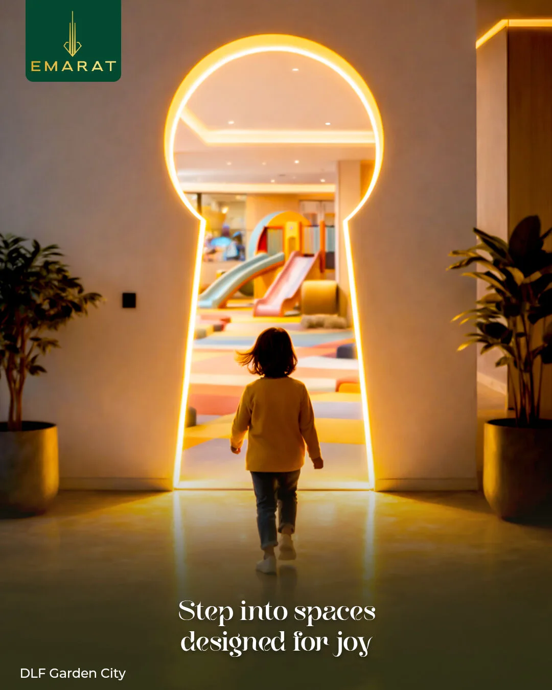 Child walking toward a glowing keyhole doorway opening onto a colourful indoor play area, "Step into spaces designed for joy"