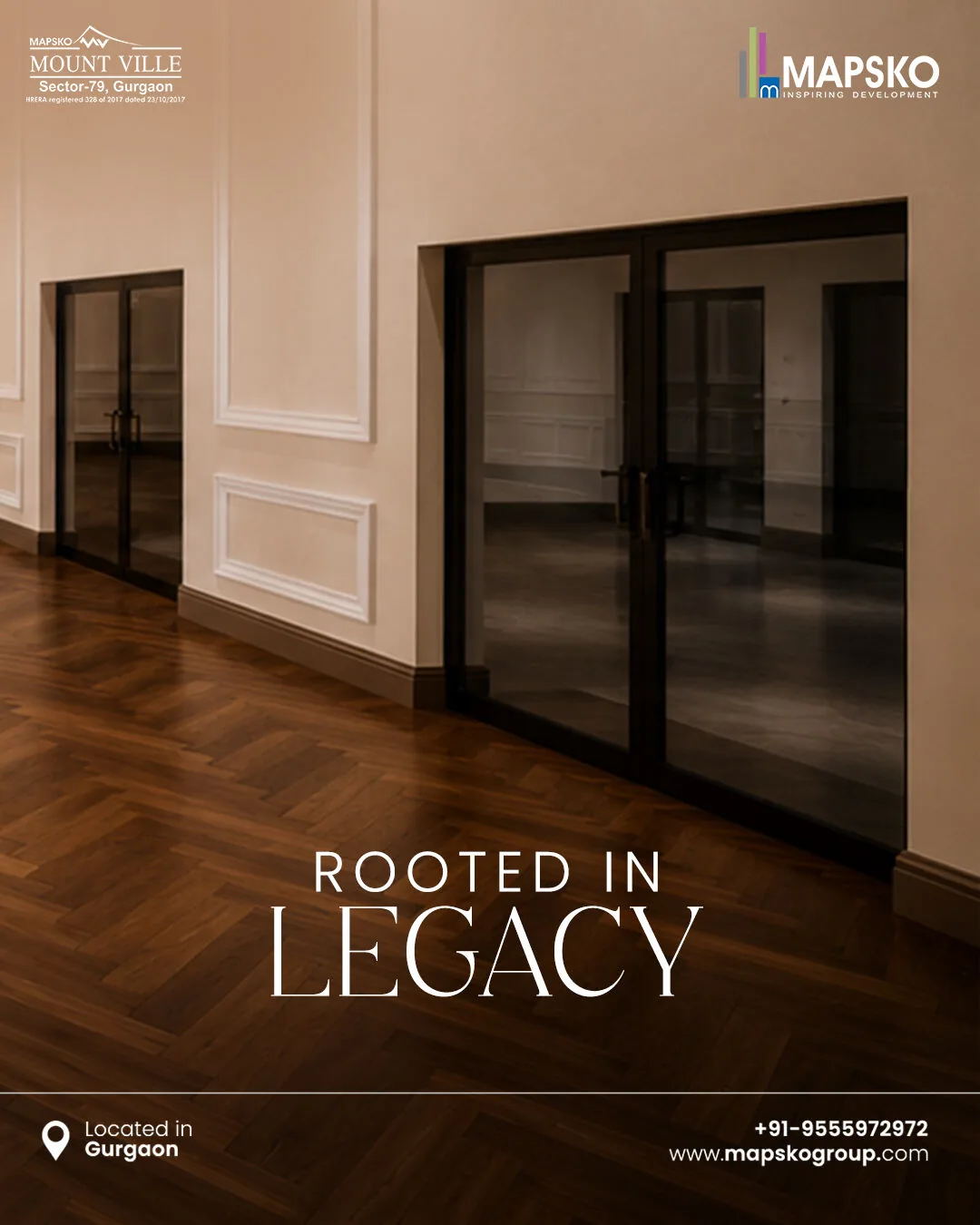 Mount Ville post reading Rooted in legacy, over glass doors set into cream panelled walls above a herringbone wood floor